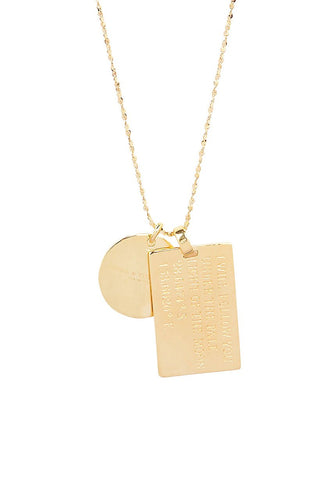 close-up-back-view-of-spell-s-capricorn-stargazer-zodiac-necklace-charms-one-charm-is-of-a-rectangular-shape-and-an-inspirational-quote-while-the-other-charm-is-circular-the-brand-name