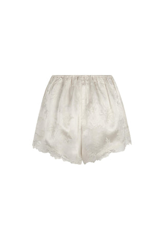 off-white-satin-shorts-with-a-subtle-floral-jacquard-pattern-and-a-delicate-lace-hem-shown-against-a-plain-white-background