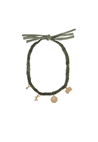 an-olive-green-braided-cord-bracelet-with-a-knotted-tie-at-the-top-and-three-dangling-charms-in-a-gold-tone-shown-against-a-plain-white-background