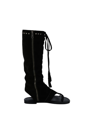 A black suede knee-high boot with a side zipper, silver studs, and a lace-up front detail, shown against a plain white background.