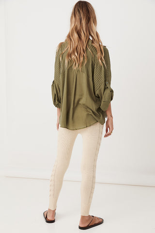 studio-model-lea-mohr-wearing-the-spell-linda-knit-pants-the-pants-come-in-a-sand-colourway-and-feature-functional-pockets-a-functional-drawstring-waist-tie-and-knit-detailing-down-the-legs