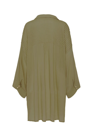 studio-model-lea-mohr-wearing-the-spell-linda-mini-dress-the-mini-dress-comes-in-a-khaki-colourway-and-features-patch-pockets-on-the-front-side-splits-a-shell-button-down-front-a-drop-shoulder-full-length-sleeve-and-a-button-tab-on-the-sleeve