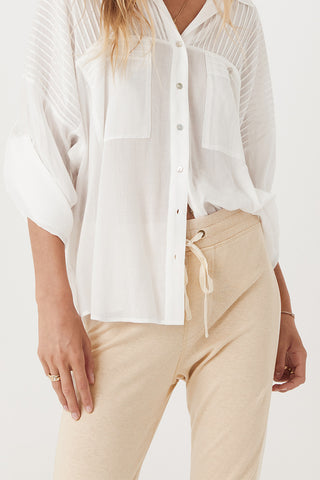 studio-model-lea-mohr-wearing-the-spell-maverick-racer-stripe-trackpants-the-pants-come-in-a-stone-colourway-and-feature-a-waistband-with-drawstring-and-a-contrast-stripe-down-the-outer-leg